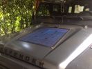 Lensun solar panel on defender bonnet.JPG